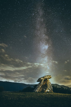Dolmen sorginetxe in Agurain, Alava, Basque Country. Milky way