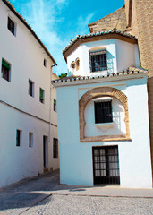 Fototapeta na wymiar Arabic bell tower located in Ronda Spain in a sunny day