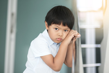 A Portrait of depressed Asian boy.