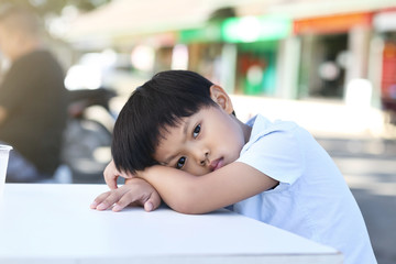 A Portrait of depressed Asian boy.
