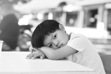 A Portrait of depressed Asian boy, black and white tone.