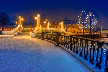 St. Petersburg on a festive evening. Christmas in Russia. Bridges Of St. Petersburg. Rivers Of St. Petersburg. Festive city illumination. Staro-Nikolsky bridge. Kryukov canal. New year in Russia.