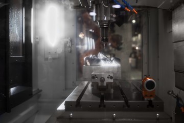 Automated robotic drill working on steel human face
