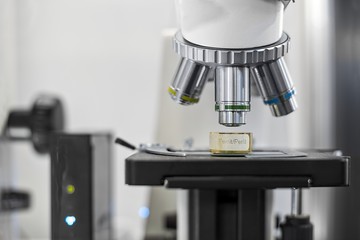 White microscope close-up photo inside laboratory