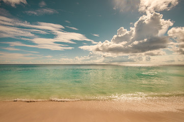 Retro style image of tropical island beach