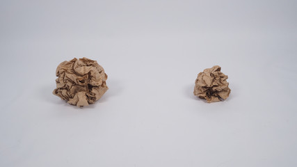 Crumpled brown paper.It is mauled on white background.
