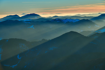 Aerial Landscape view from Ceahlău Mountains National Park at sunset in winter season,Sunset in Ceahlau Mountains