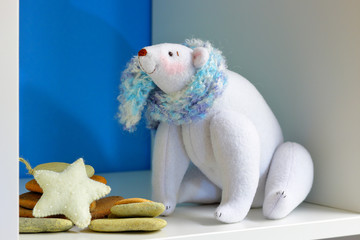 Soft handmade toy of a white polar bear