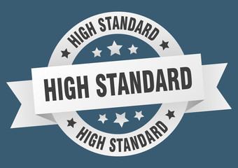 high standard ribbon. high standard round white sign. high standard