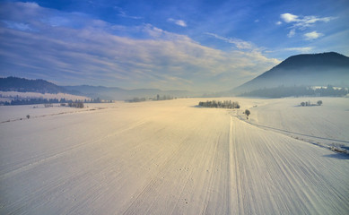 Obraz na płótnie Canvas Amazing aerial view of a winter Landscape by the drone