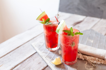 Watermelon drink in glasses with slices of water melon