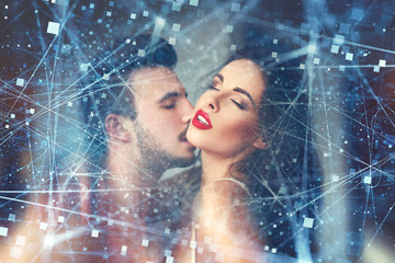 Sensual lovers foreplay indoor with virtual connections conept