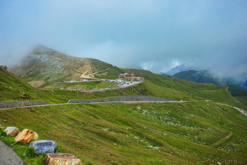 Fototapeta premium grossglockner high alpine road among the clouds - destination in austria