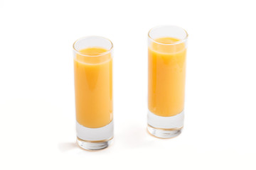 Sweet egg liqueur in glass isolated on white background. Side view