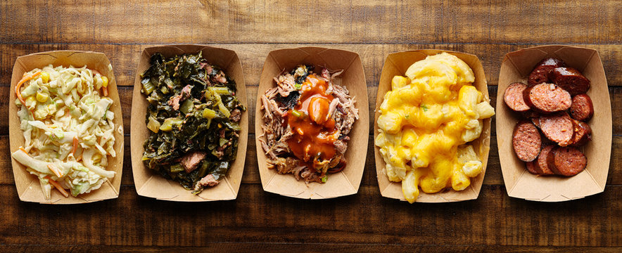 Assorted Trays Of Texas Bbq With Collard Greens, Hotlinks, Pulled Pork, Mac And Cheese, Coleslaw