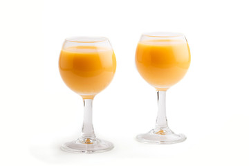 Sweet egg liqueur in glass isolated on white background. Side view