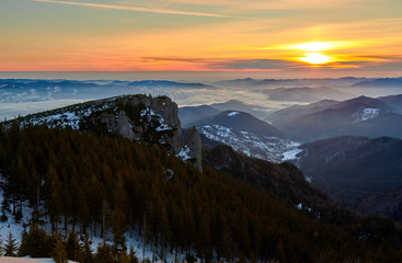 Amazing sunrise view from Ceahlău Mountains National in winter season, Winter Landscape in National Park Ceahlau