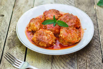 meatballs in tomato sauce (meat dish). food background. top view. copy space