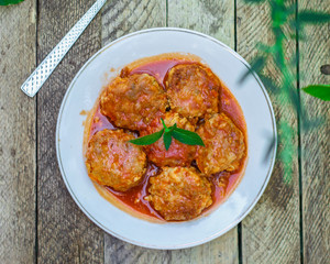 meatballs in tomato sauce (meat dish). food background. top view. copy space