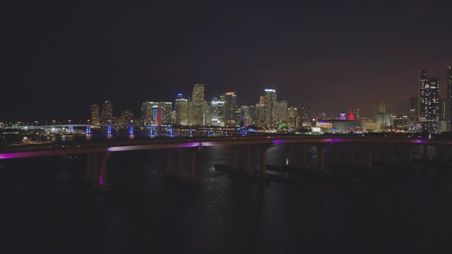 Aerial over Macarthur Causeway reveal Downtown Miami 4k