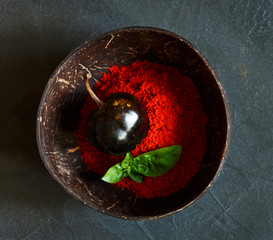 Chili Pepper Powder with basil in bowl on grey background - 289086809