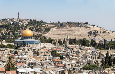 Fototapeta na wymiar View of the Dome of the Rock and Mount of Olives from the bell tower of the Lutheran Church of the Redeemer on Muristan street in the Old City in Jerusalem, Israel