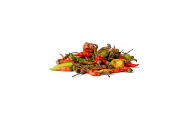 Mixed dried red and green chilies isolated on white background 