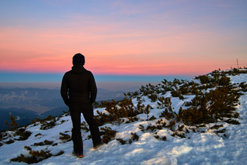 Amazing sunset view from Ceahlău Mountains National in winter season,Aerial winter Landscape