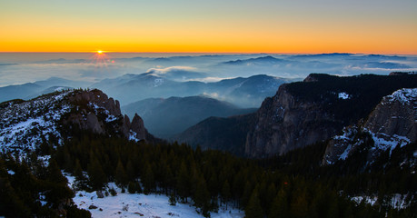 Aerial Landscape view from Ceahlău Mountains National Park at sunset in winter season,Sunset in Ceahlau Mountains