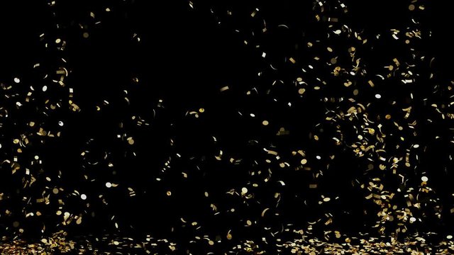 A fountain of golden confetti falling on the floor with alpha channel
