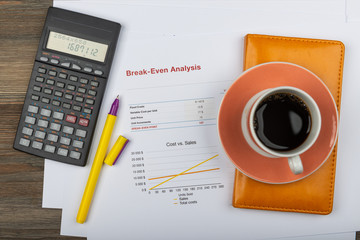 Office workplace table with report pages