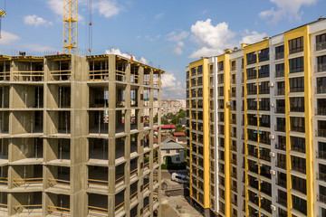 Apartment or office tall concrete building under construction.