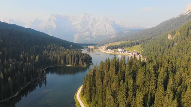 Aerial woods forest mountain lake drone dawn