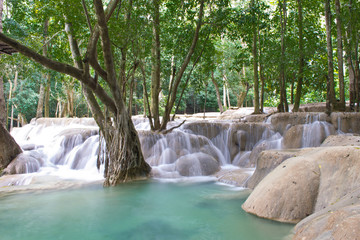 Laos Tad Sae Waterfall in the green forest, long exposure showing the nature of Laos, displaying soft water and tropical paradise, vivid colors