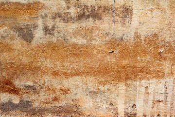 Texture of a concrete wall with cracks and scratches which can be used as a background