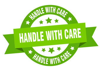 handle with care ribbon. handle with care round green sign. handle with care