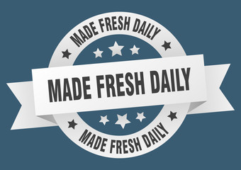 made fresh daily ribbon. made fresh daily round white sign. made fresh daily