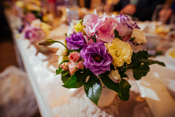 Luxurious restaurant decorated with floral arrangement at a wedding ceremony