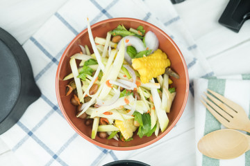 Thai spicy green mango and corn salad