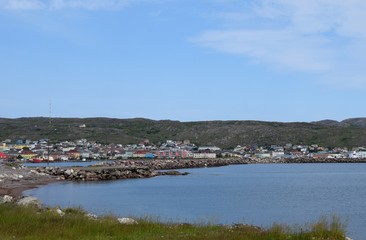 Saint Pierre city panorama, view from the Ile aux Marin past the harbor entrance towards the town of Saint Pierre, Saint Pierre and Miquelon 