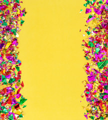 Party background Colorful confetti decoration yellow paper texture