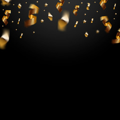 Golden foil confetti on black background