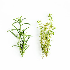 Fototapeta premium Green branchs of rosemary, thyme isolated on a white background. Flat lay. Top view