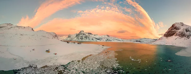 Papier Peint photo autocollant Reinefjorden Aerial drone panorama photo. Beautiful sunset over the mountains and sea of the Lofoten Islands. Reine, Norway. Winter landscape with amazing colors.