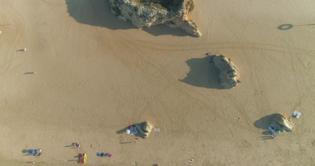 Aerial view of Praia dos Tres Irmaos (Three Brothers beach) in Alvor, famous tourist destination in Western Algarve Coast, Portugal.