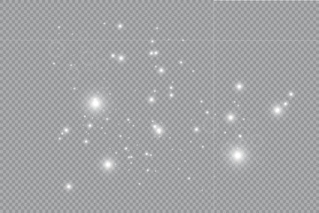 Dust white. White sparks and golden stars shine with special light. sparkles on a transparent background. Christmas abstract pattern. Sparkling magical dust particles.