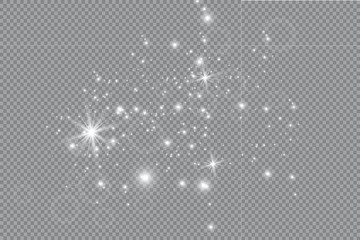 Dust white. White sparks and golden stars shine with special light. sparkles on a transparent background. Christmas abstract pattern. Sparkling magical dust particles.