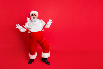 Fototapeta na wymiar Full body photo of cheerful fat overweight santa claus with funny big belly abdomen laugh fool wear style trendy eyewear eyeglasses isolated over red background