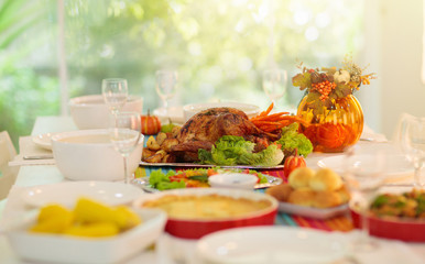 Fototapeta na wymiar Thanksgiving dinner. Turkey table setting.