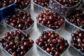 baskets full of red and ripe cherries, at local vegetable market, agriculture, food, diet, vitamins, fruit, summer, background, Milan, Italy